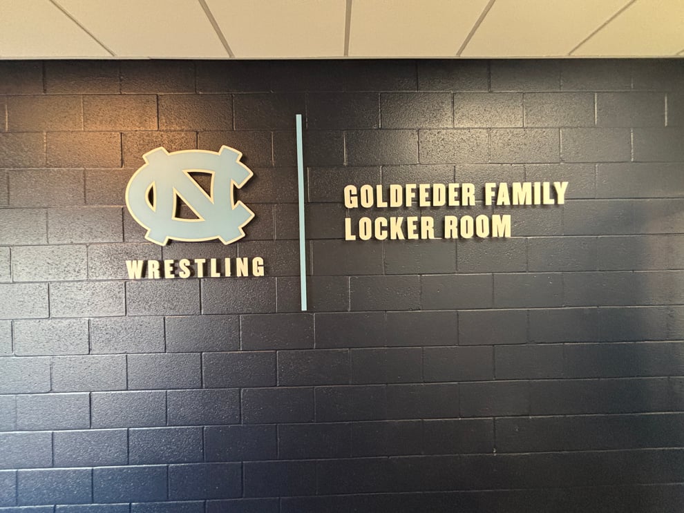 Dimensional Letters in Greensboro, NC designed and installed with backlit lighting for workplace interiors