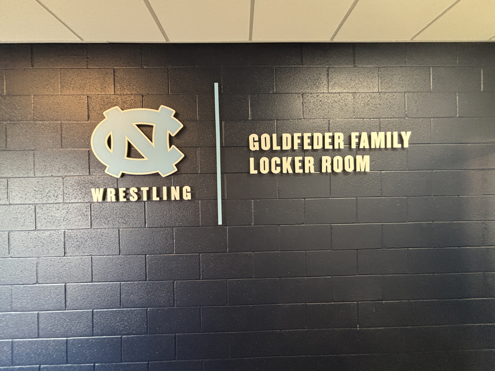 Dimensional Letters in Raleigh, NC designed and installed with backlit lighting for workplace interiors