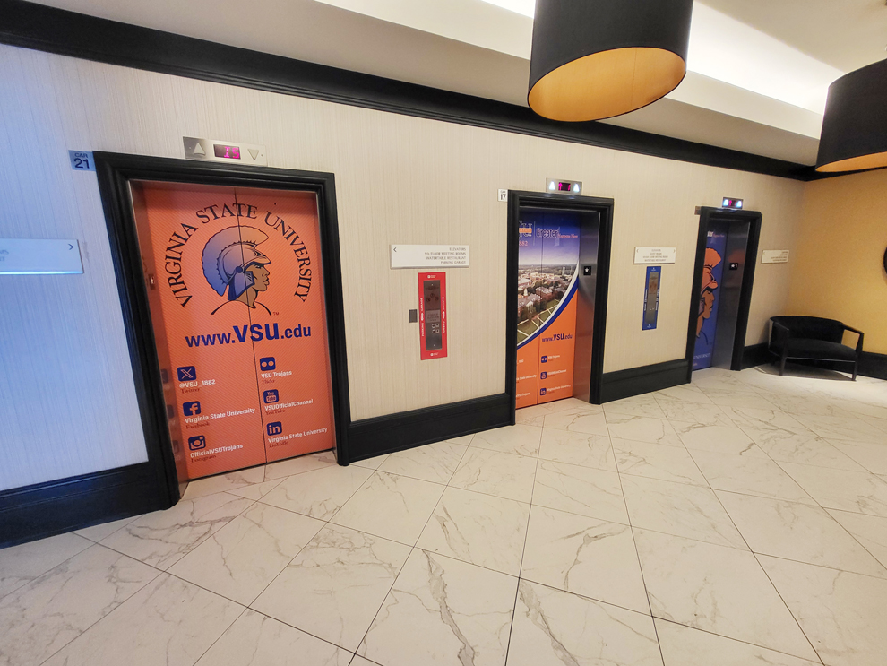 Elevator Wraps in Greensboro, NC designed and installed for corporate office branding and interior graphics