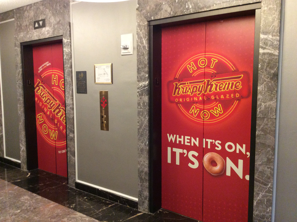 Elevator Wraps in Newport News, VA designed and installed for workplace environments and brand identity