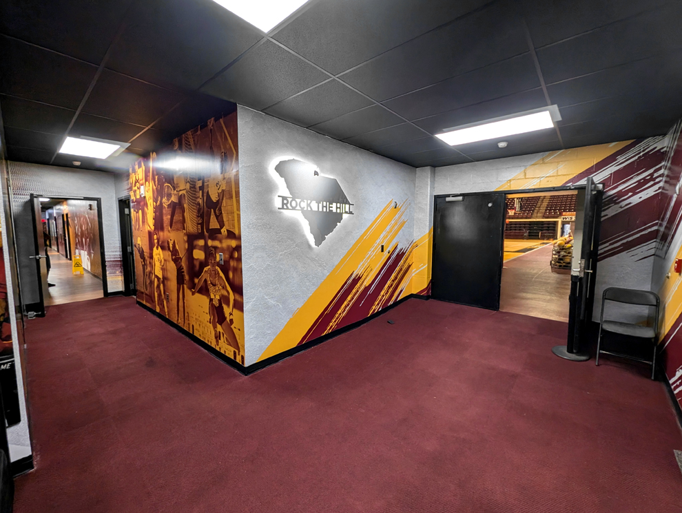 Athletic facility branded with environmental graphic design in Burlington, NC