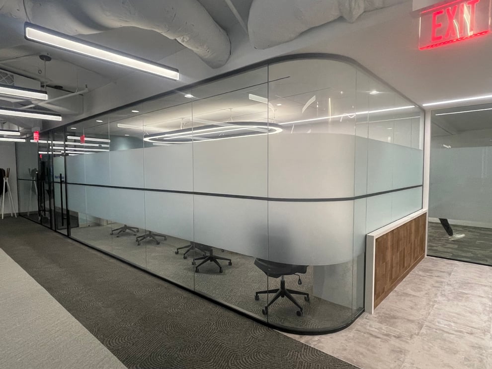 Frosted Vinyl in Raleigh, NC designed and installed for workplace privacy and brand reinforcement