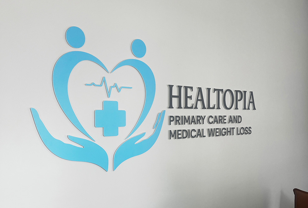 Lobby Signs Chapel Hill NC designed and installed using fabricated dimensional lettering for corporate branding