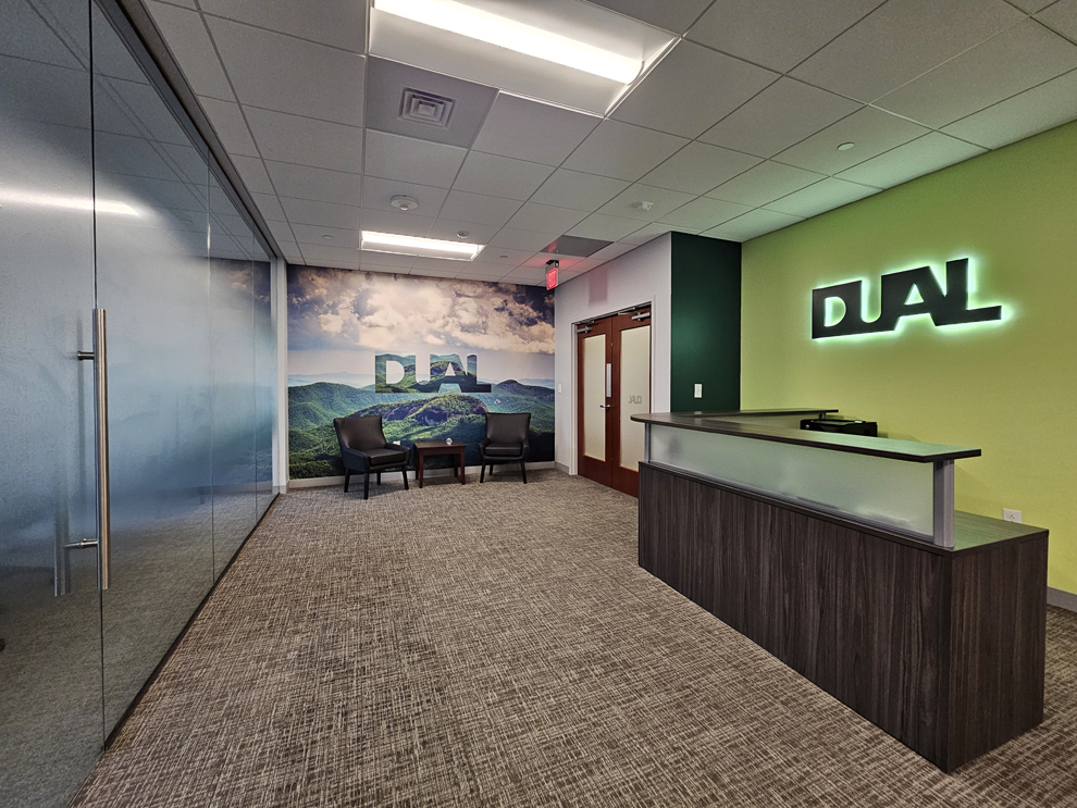 Window Graphics in Newport News, VA designed and installed with perforated film for storefront visibility