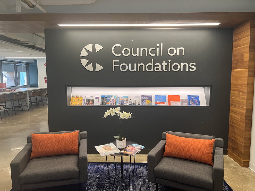 Lobby Signs Raleigh NC designed and installed with custom lettering for reception wall branding