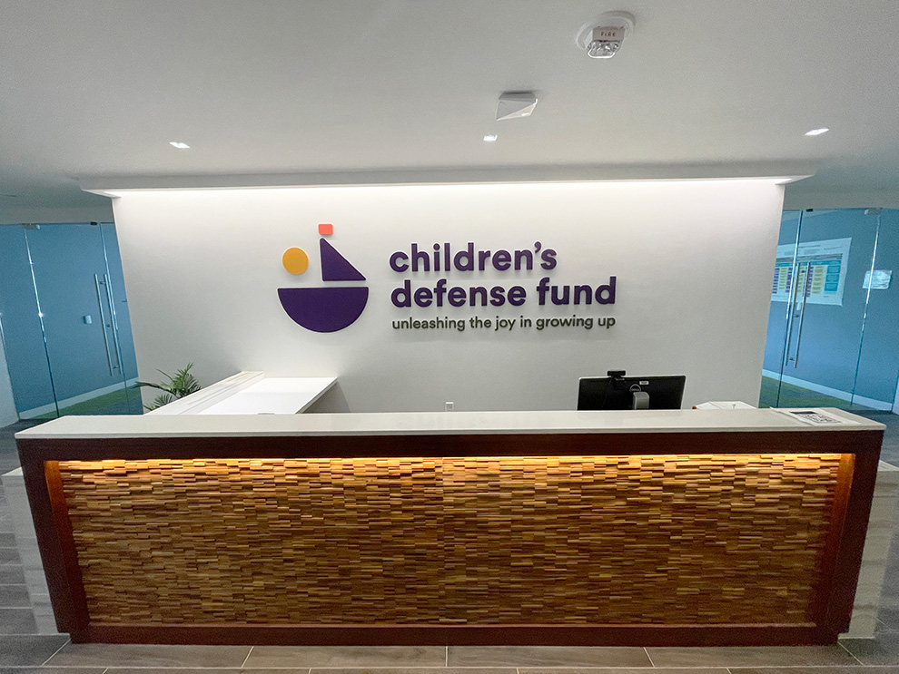 Lobby Signs Spartanburg, SC designed and installed to support office branding with interior wall graphic