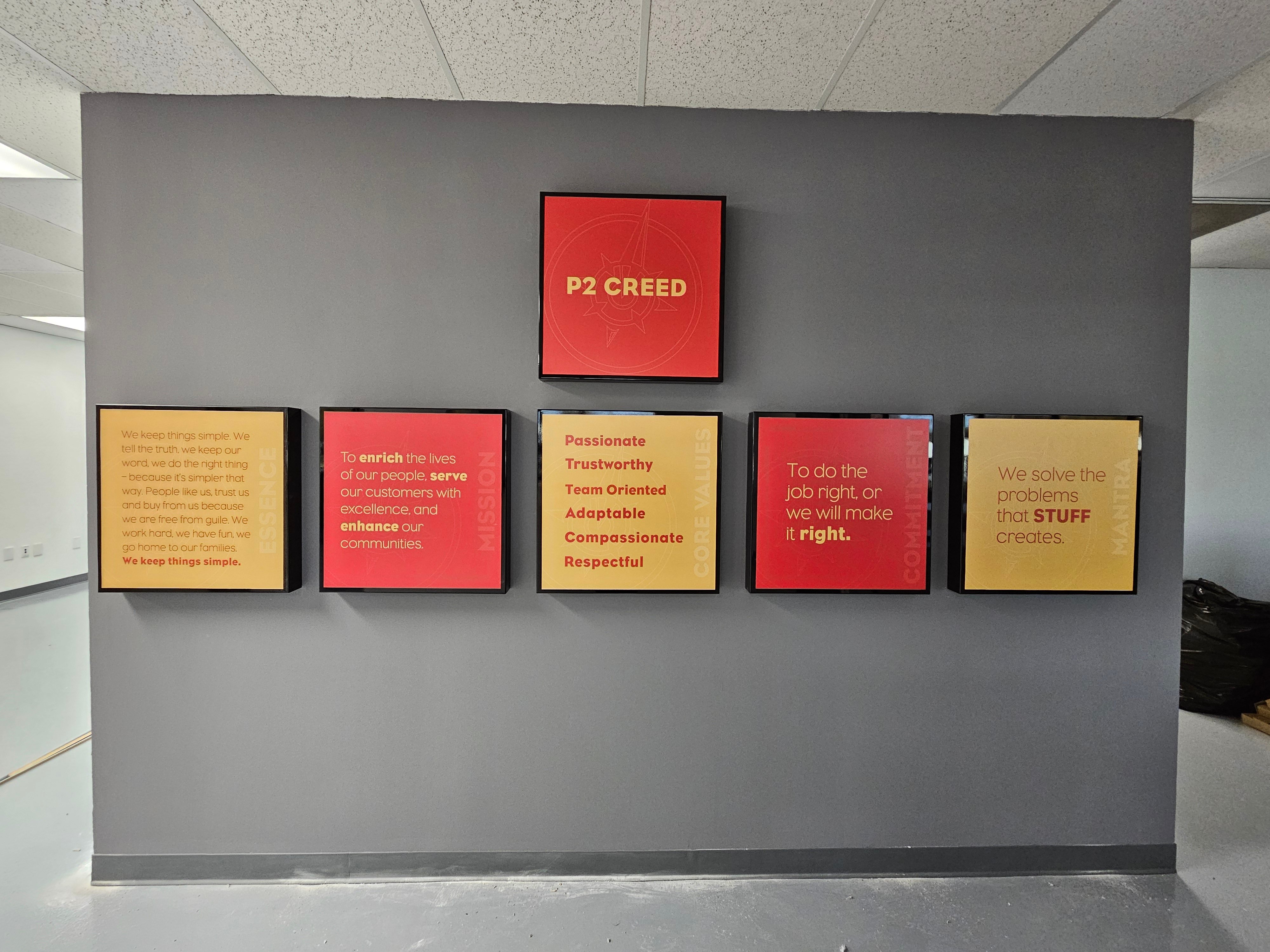 Corporate mission statement wall display installed in Raleigh, NC office