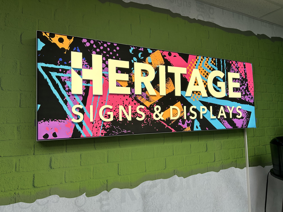 Custom SEG fabric graphics with lightbox display for events in Raleigh, NC