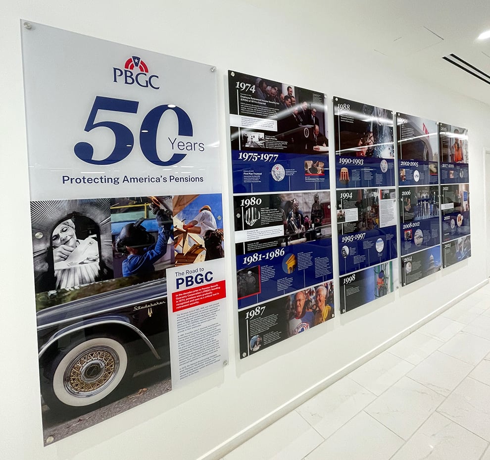 Standoff Mounted Signs in Decatur, GA designed and installed for Plexiglass wall branding in workplaces