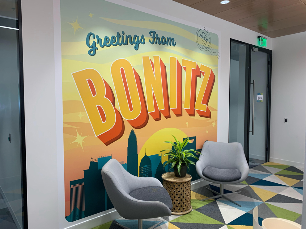 Branded storefront graphics and wall wrap for retail business near Virginia Beach, VA