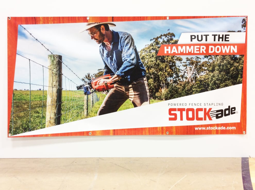 Mesh fence wraps and vinyl banners for property branding in Greensboro, NC
