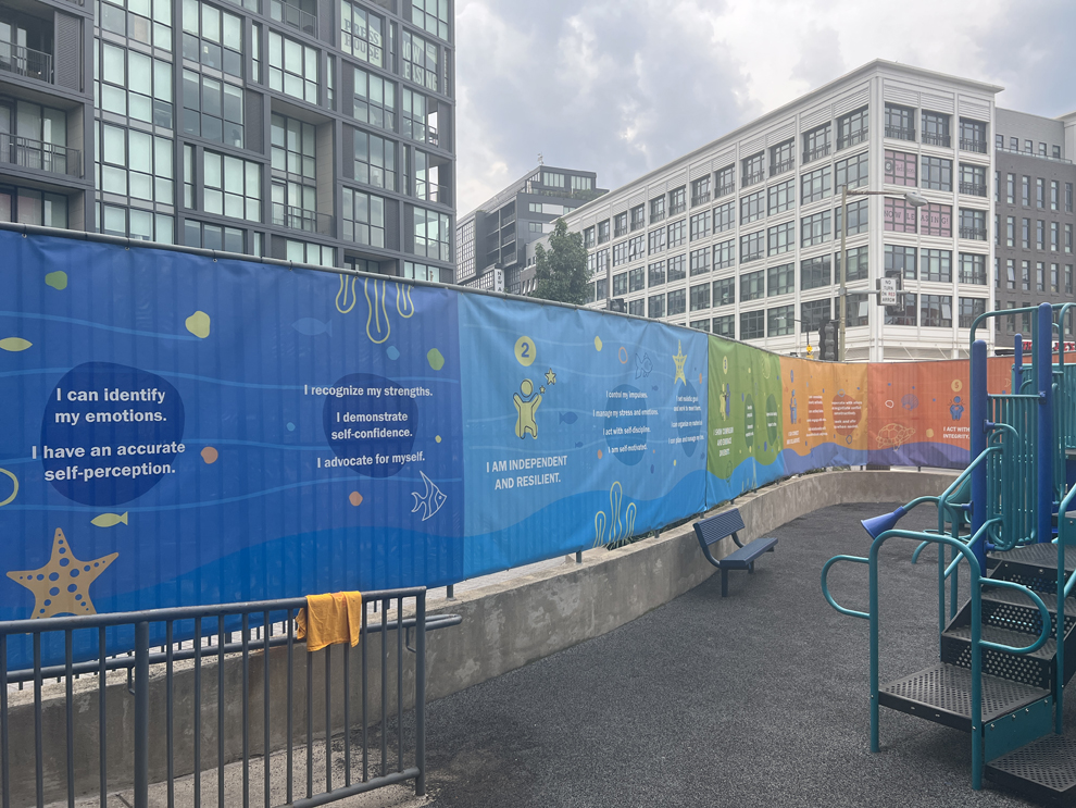 Mesh fence wraps and large vinyl banners installed in Greensboro, NC