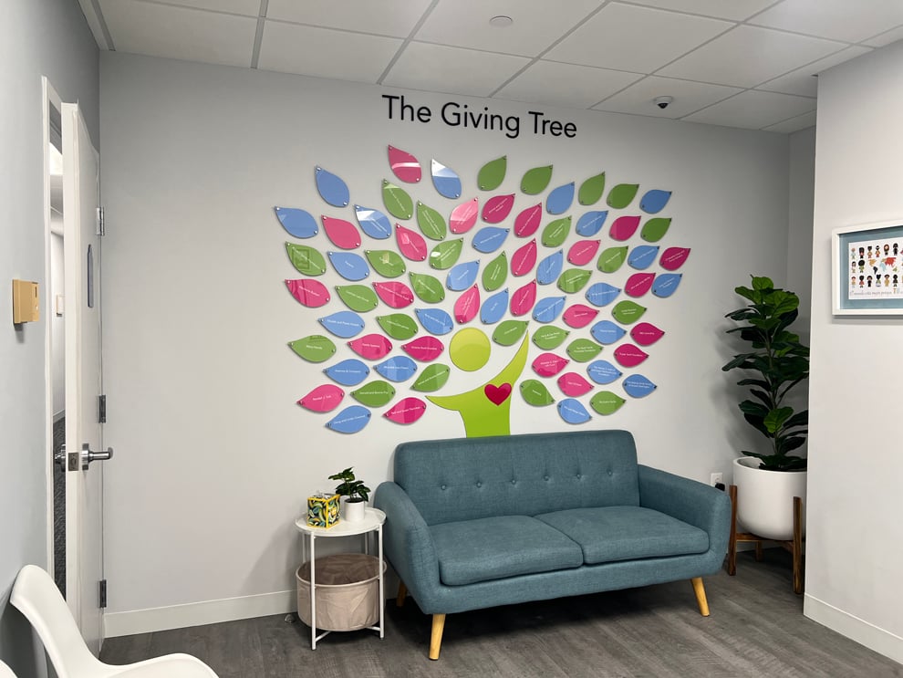 Wall displays with branded graphics in Burlington, NC, workplaces
