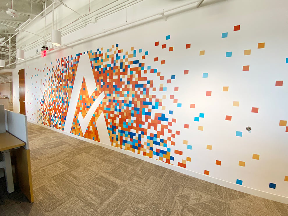 Branded conference room wall wrap design for workplace in Decatur, GA