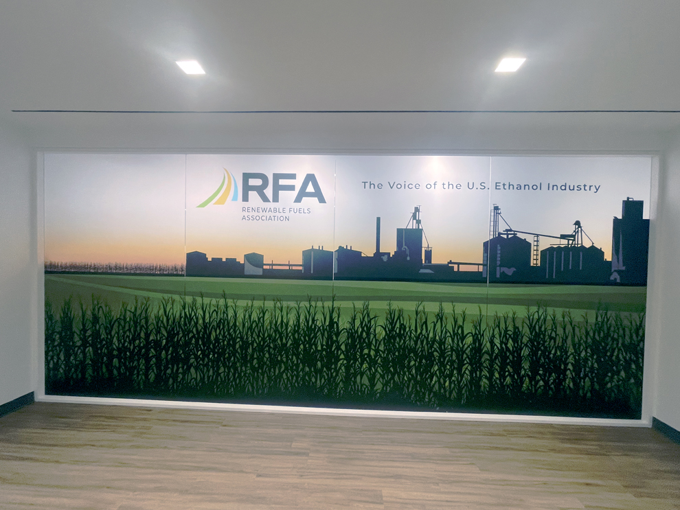 Large wall graphic installation transforming Virginia Beach, VA workplace interior