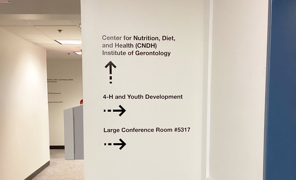Workplace and office interiors with branded wayfinding signs in Morrisville, NC
