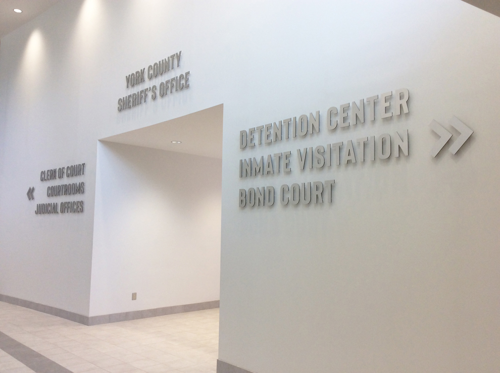 Branded wayfinding signs installed for office environments in Virginia Beach, VA