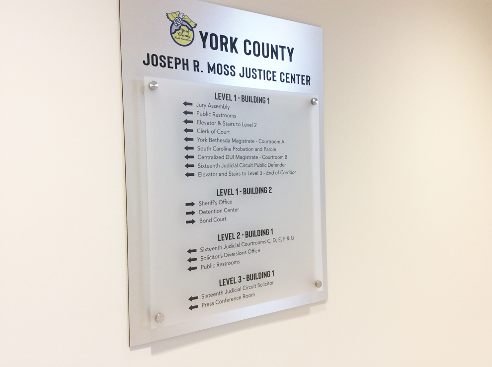 Wayfinding signs and directional graphics guiding workplace navigation in Winston-Salem, NC