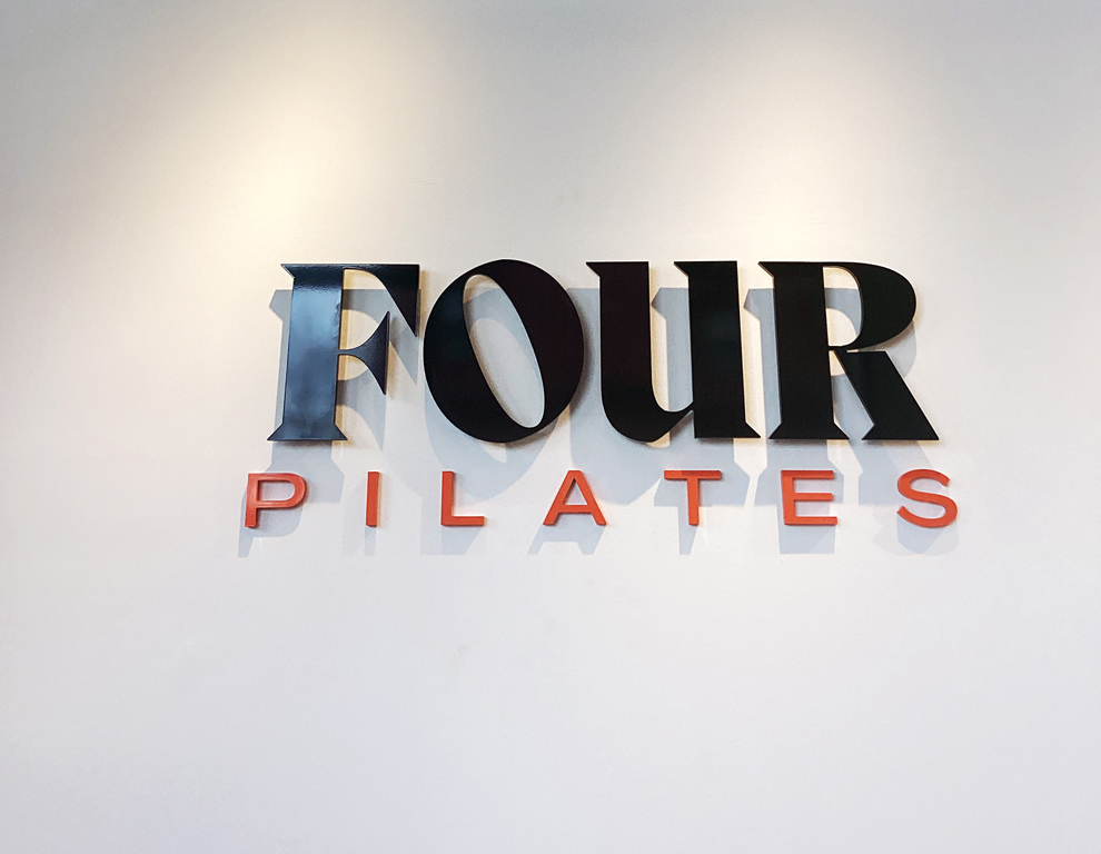 Sign Shop in Hampton, VA designed and installed workplace displays and office wall graphics