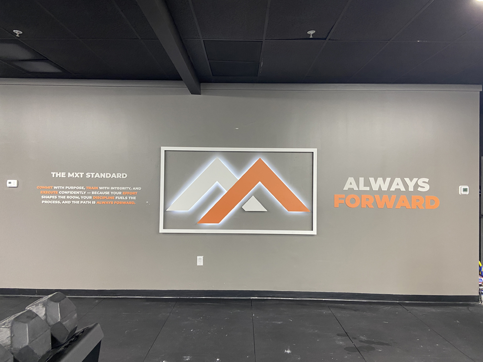 Sign Shop in High Point, NC designed and installed dimensional office signs and wall graphics