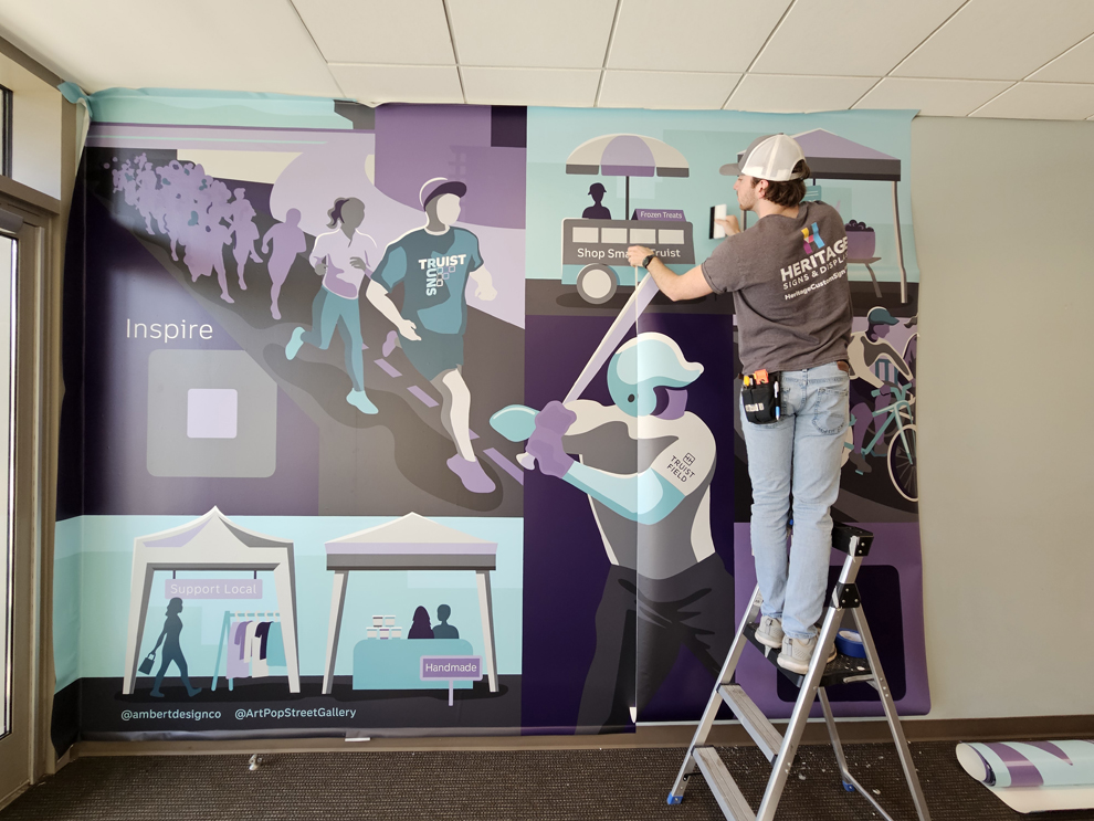 Custom wall wrap and interior sign installation in Atlanta, GA