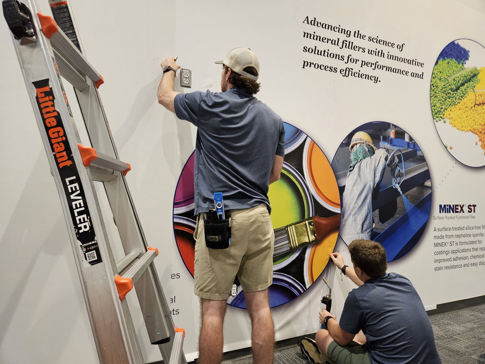Branded wall graphics and sign installation in Chapel Hill, NC workplace