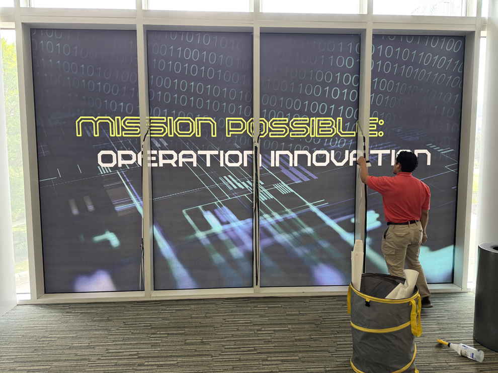 Professional office sign installation with custom graphics in Greenville, SC